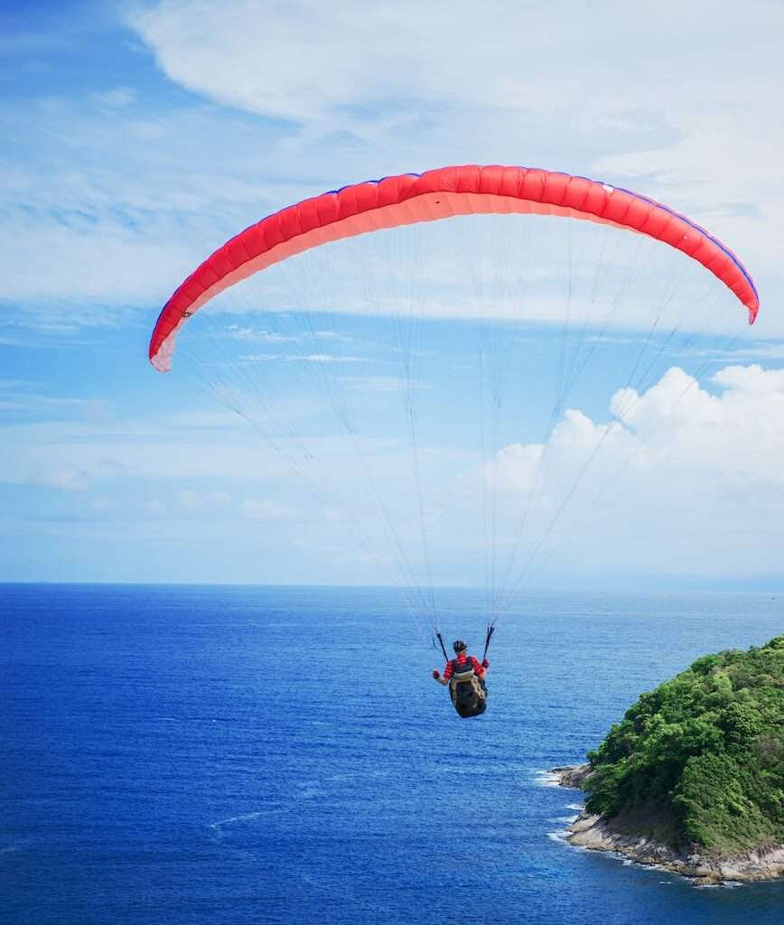 photography of person doing parachute